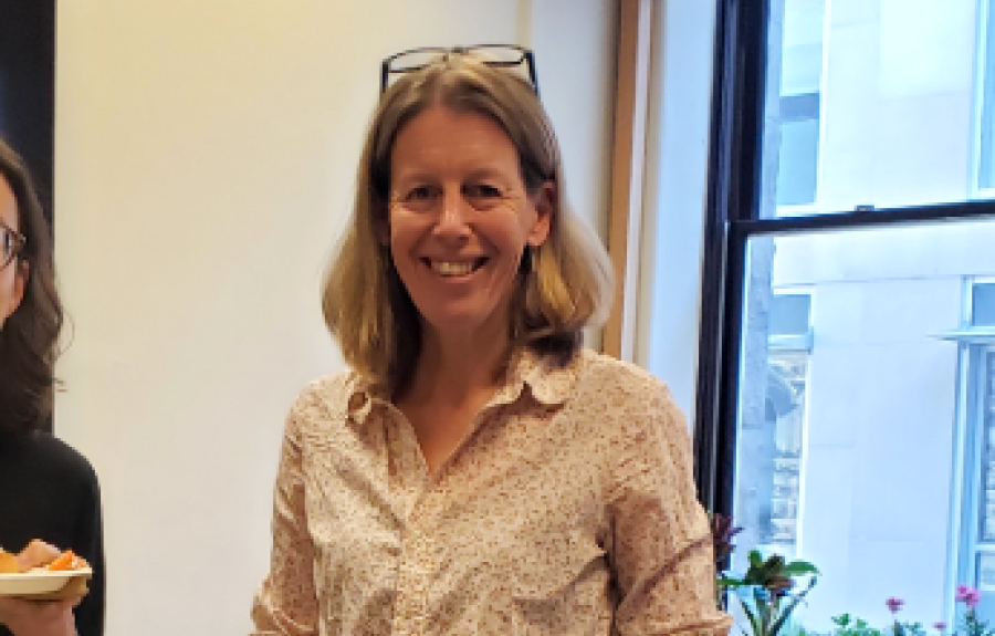 Jocelyn Holland (Caltech) talking to attendees at the Institute for German Cultural Studies colloquium reception.